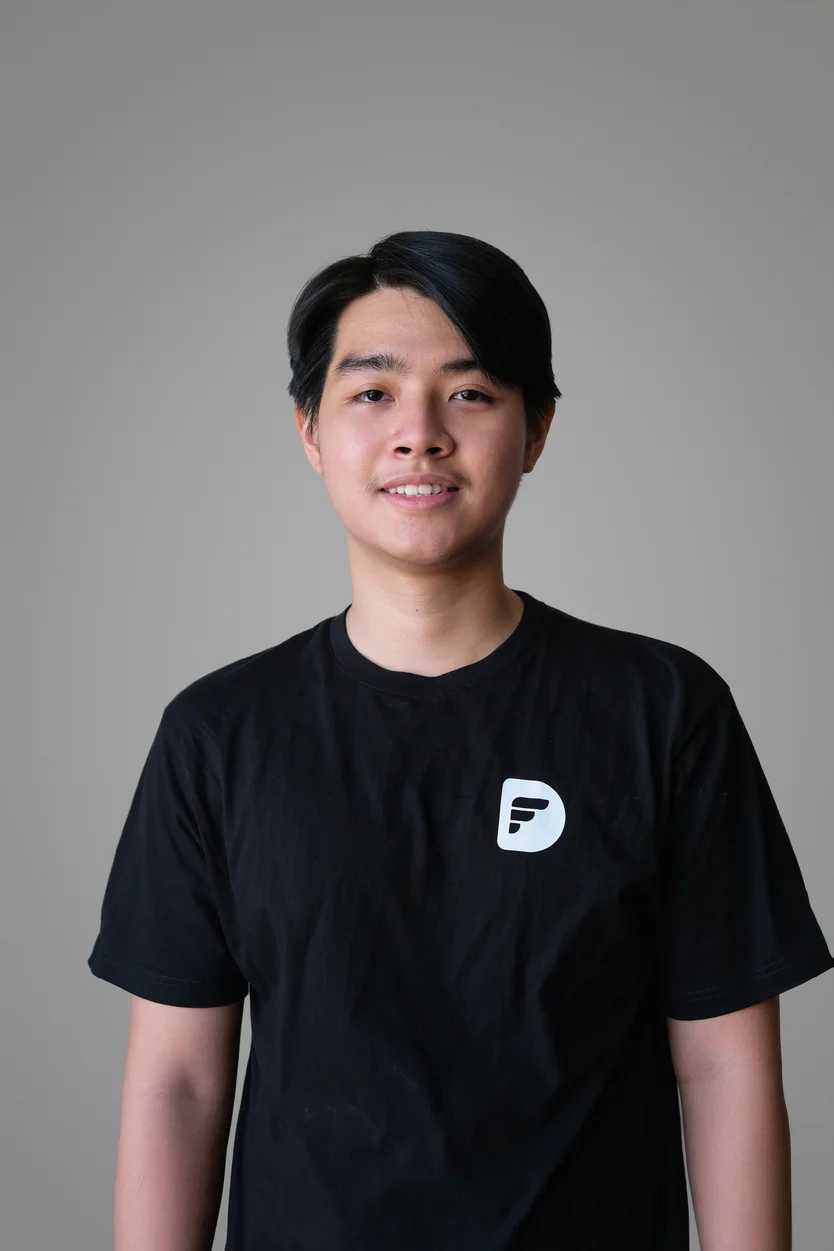 Dinh Nam with his team